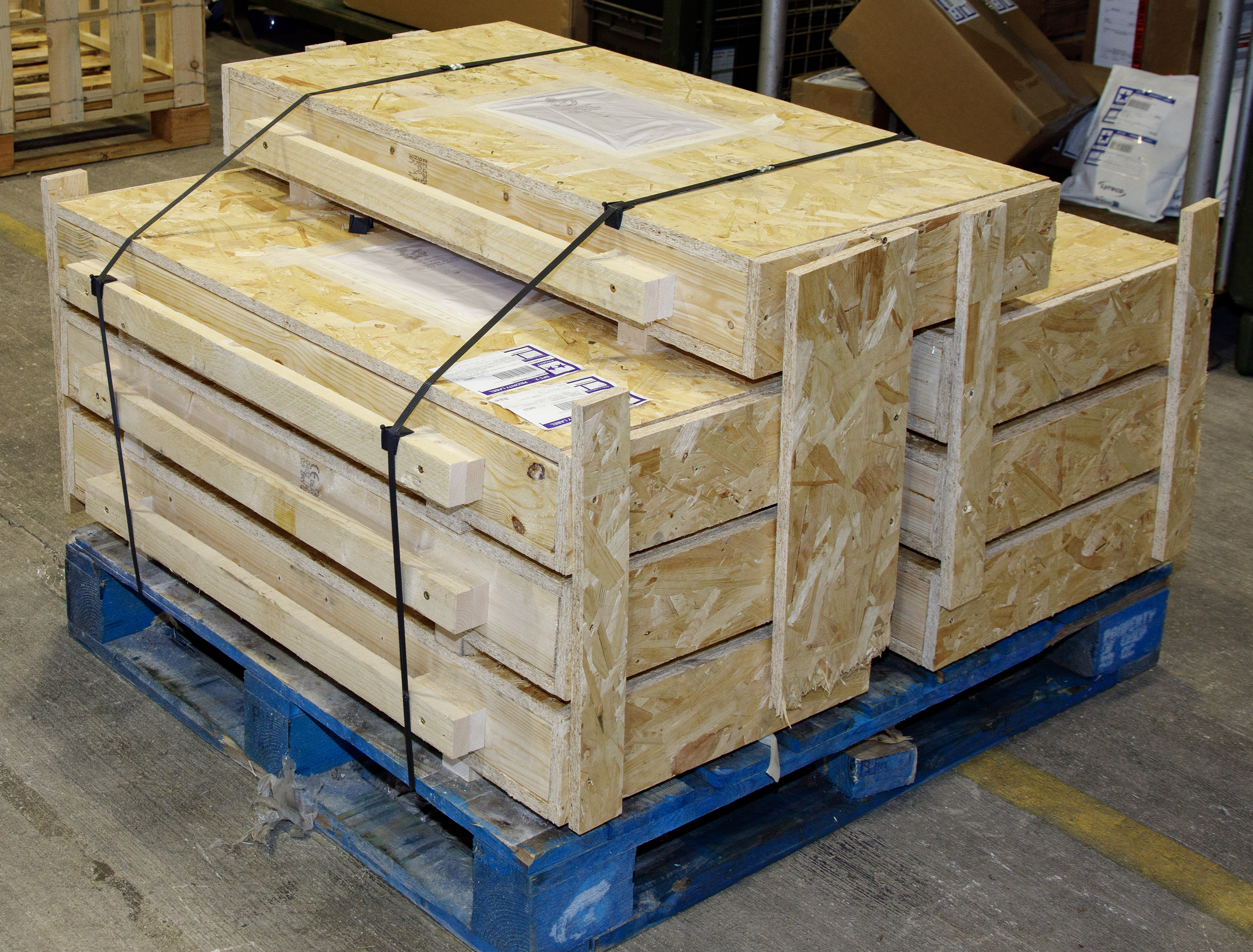 Photo: Image shows boxed headstones, palleted ready for transport.